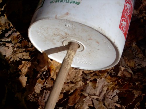 chewed up bucket deer feeder
